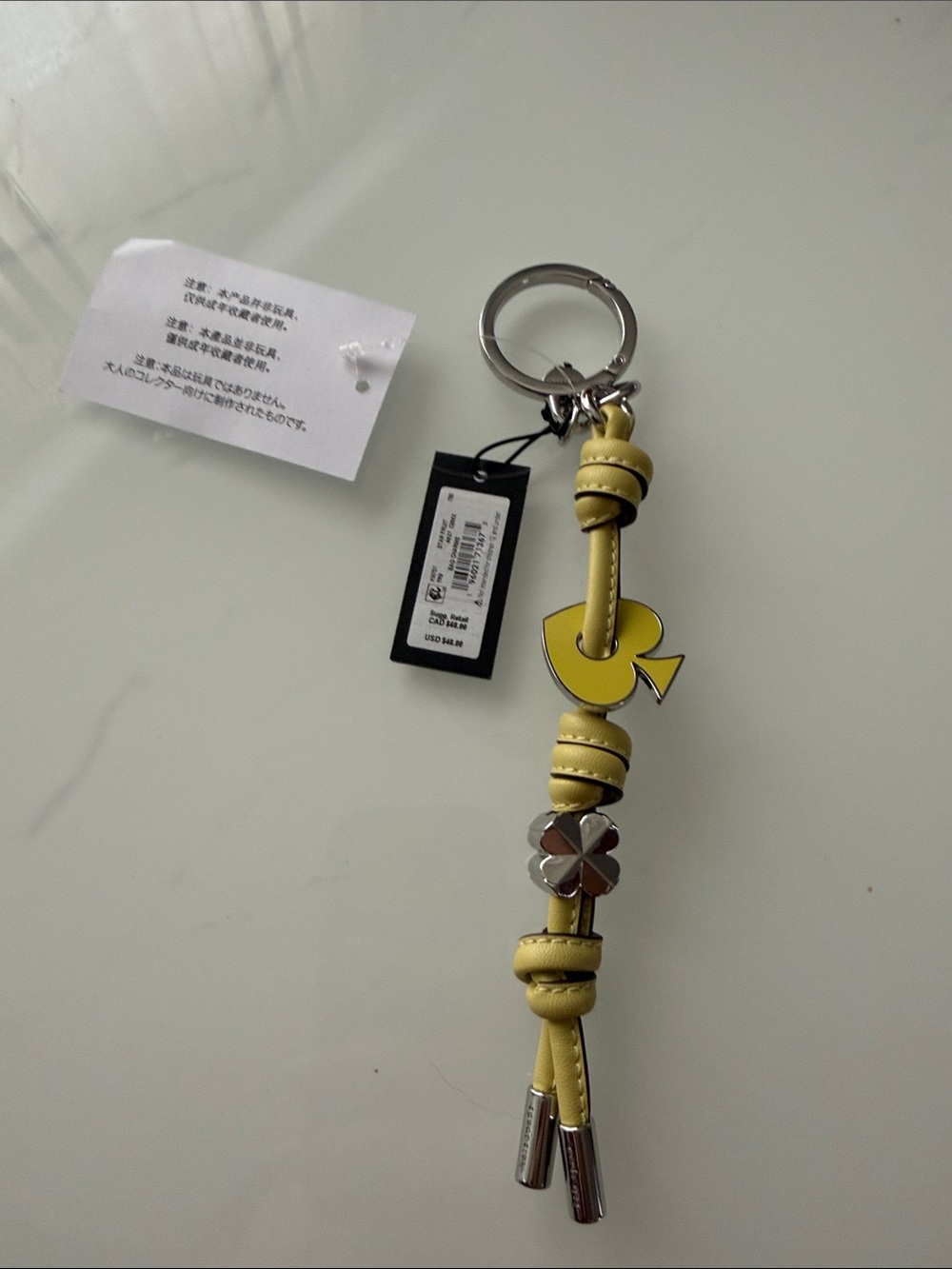 kate spade Yellow Leather Knot Tassel Key & Card Holder with Clover Accent